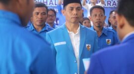 Ketua KNPI Irwan Muksin, mengenakan Kofi hitam, (Istimewa). 