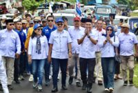 Bapaslon JUJUR saat tiba di Lokasi KPU Halbar, || Foto: Elang. 